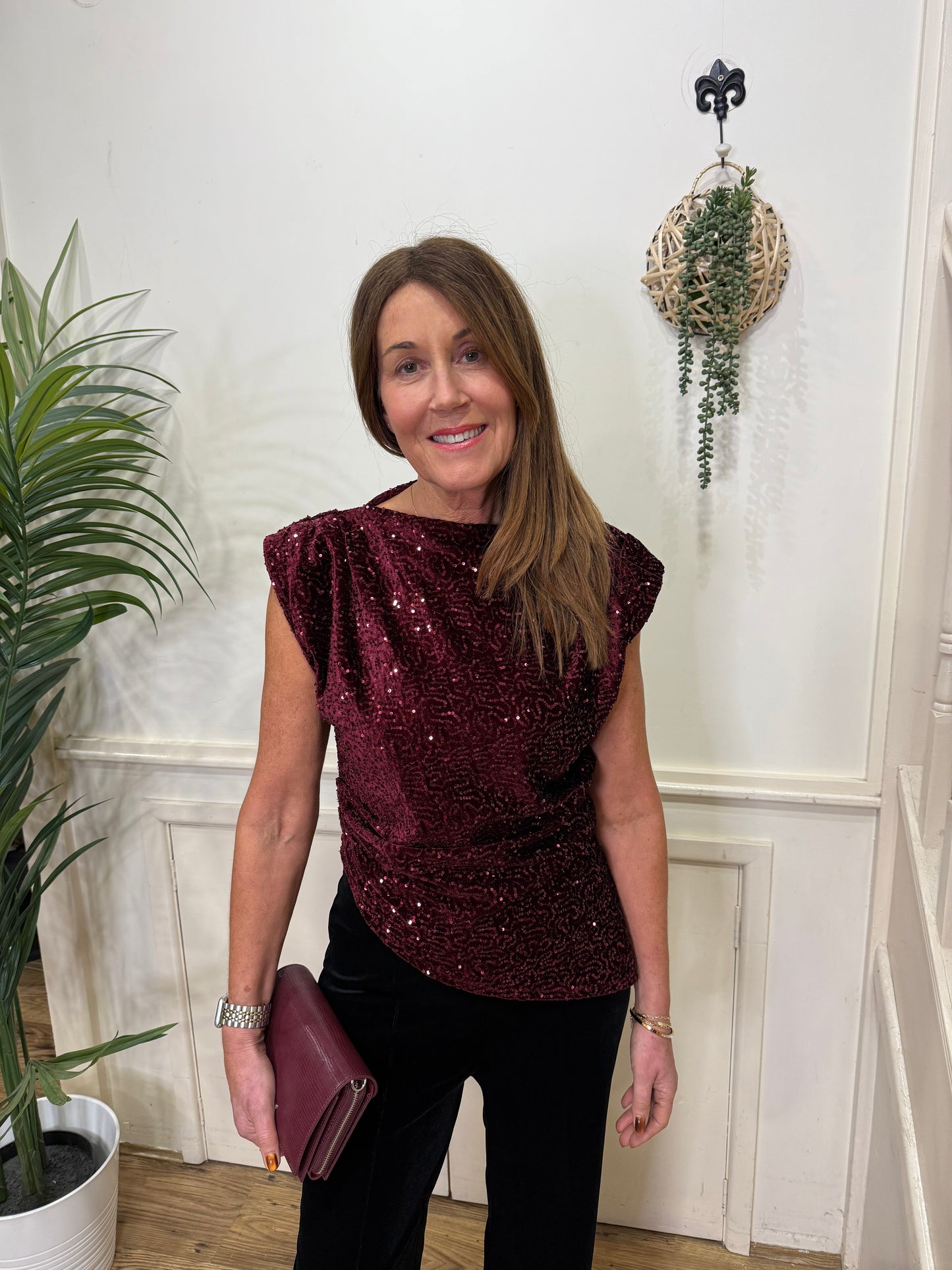 PEGGY - Sequin slash neck top with asymmetrical hem line